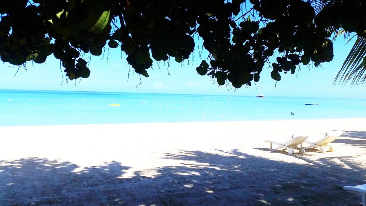 Отель Idle Awhile Beach Негрил Экстерьер фото